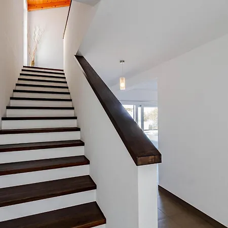 Holiday home Lovely In